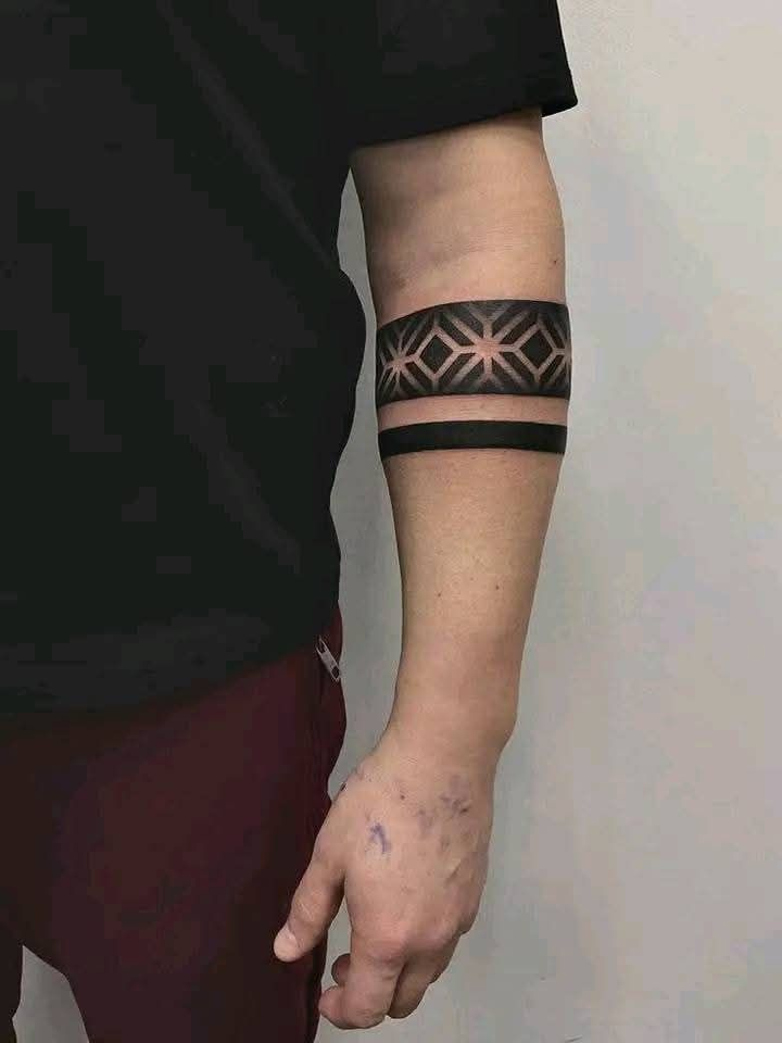 Blackout Forearm Tattoo
